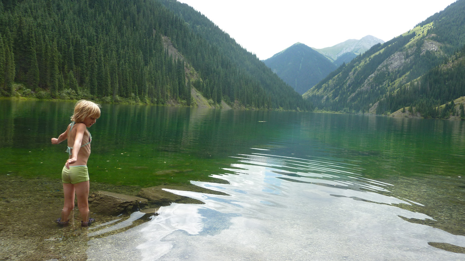 Young Kailyn by the lake in Kazakhstan