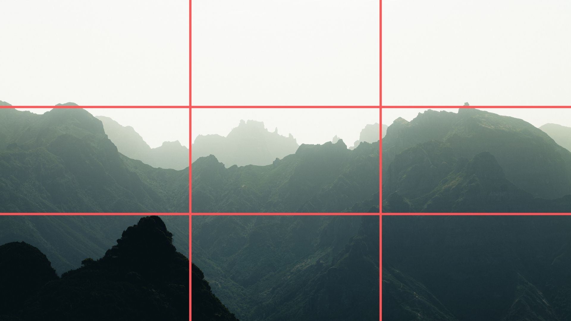 Mastering the rule of thirds by placing key visual elements along grid intersections to create a balanced photo composition.